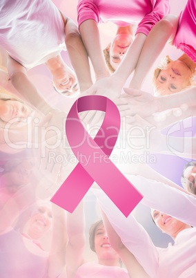 Pink ribbon with breast cancer awareness women putting hands together