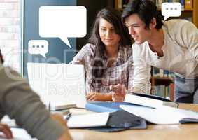 People researching in library project with empty chat bubbles