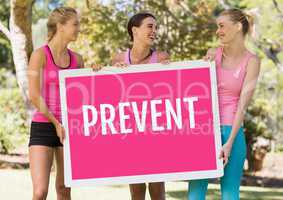 Prevent text and pink breast cancer awareness women holding card