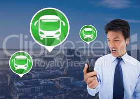 Bus icons and man holding phone in city
