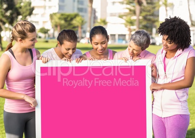 pink breast cancer awareness women holding card