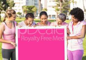 pink breast cancer awareness women holding card
