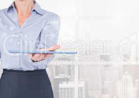 Business woman with tablet and bright background