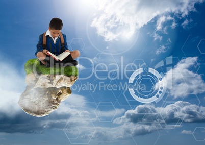 Young boy on floating rock platform  in sky reading book with futuristic interface