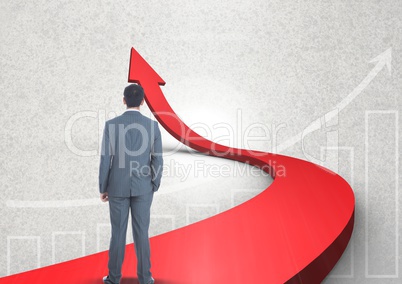 businessman standing on red arrow