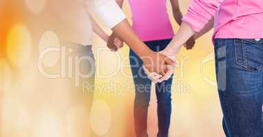 Breast cancer women with transition holding hands