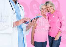 Breast cancer doctor on tablet and women with pink awareness ribbons