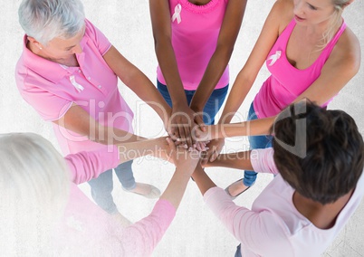 Breast cancer awareness women putting hands together