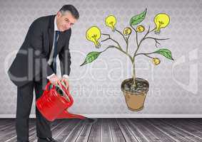 Man holding watering can and Drawing of Money and idea graphics on plant branches on wall