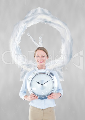 Business woman holding a clock against background with clock