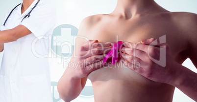 Breast cancer doctor and woman with pink awareness ribbon