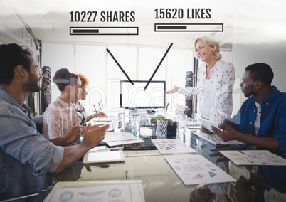 People working in office with Social media interfaces of shares and likes at meeting