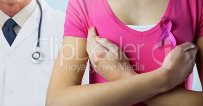 Breast cancer doctor and woman with pink awareness ribbon