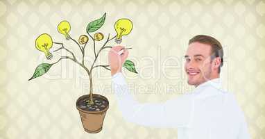 Man holding pen and Drawing of Money and idea graphics on plant branches on wall