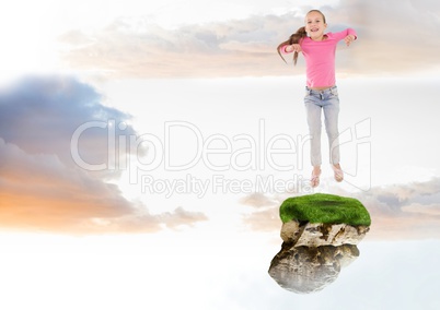 Young Girl jumping on floating rock platform  in sky