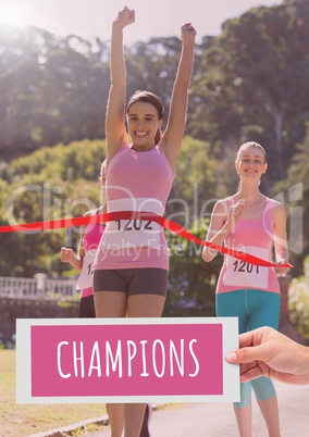 Champions Text and Hand holding card with pink breast cancer awareness women marathon run