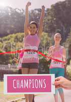 Champions Text and Hand holding card with pink breast cancer awareness women marathon run