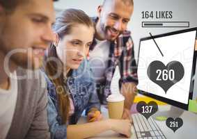 People working on computer with likes status bars  at meeting