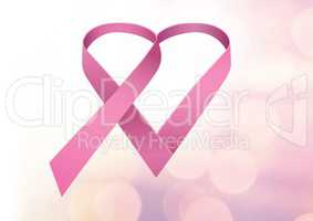 pink ribbon for breast cancer awareness over bright background