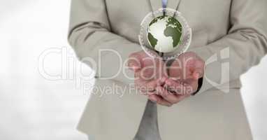 Business woman holding a globe with connectors