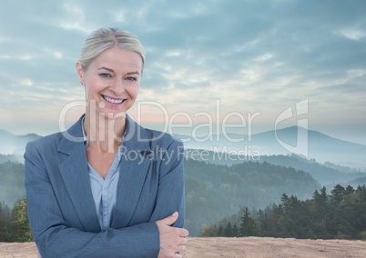 Businesswoman in nature landscape