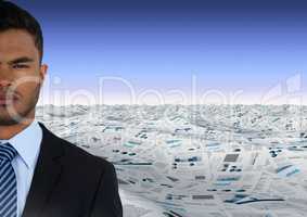 Businessman in sea of documents under sky