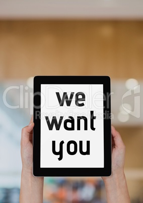 Business woman holding a tablet with we want you text