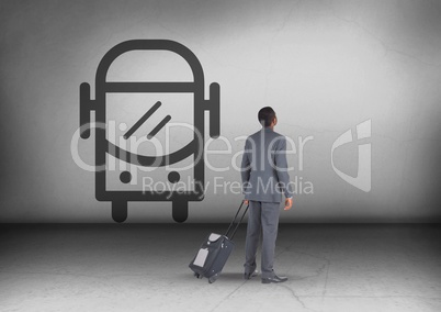 Businessman with travel bag looking up with bus icon
