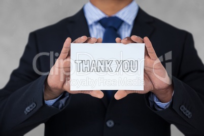 Business man holding a card with thank you text