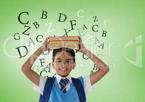 Many letters around Schoolboy holding books in front of green background