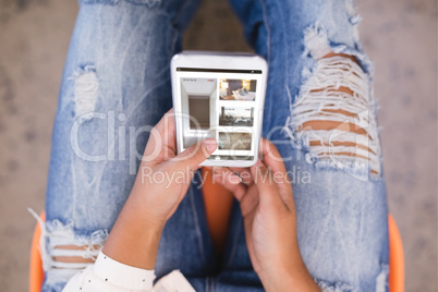 Composite image of interior of house on cellphone screen