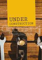 Under construction text against tools photo
