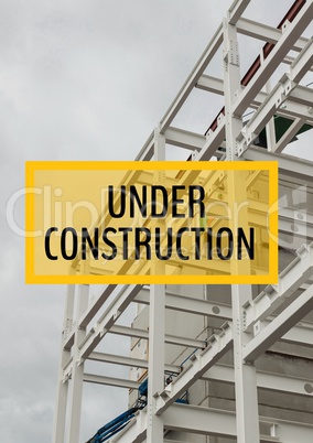 Under construction text against construction photo