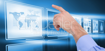 Composite image of hand of a businessman pointing something