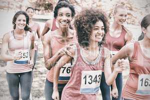 Participants of breast cancer marathon running