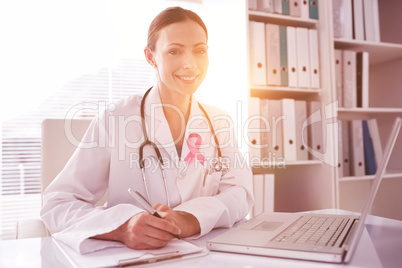 Composite image of breast cancer awareness ribbon