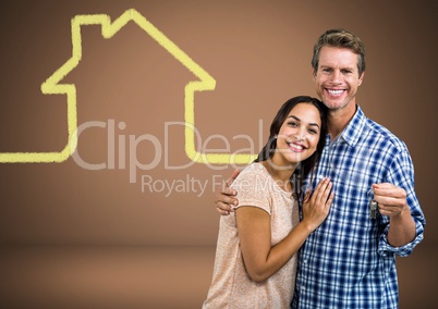 Couple Holding key with house icon in front of vignette