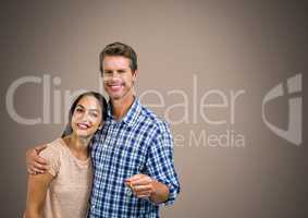 Couple Holding key in front of vignette