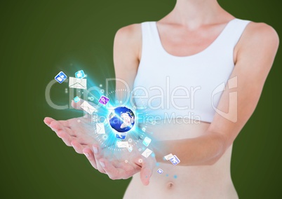 woman with hands spread of and earth with  application icons over. Green background