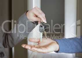 Hands Holding key in home