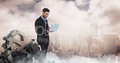 Broken concrete stone with euro symbol and businessman in cityscape