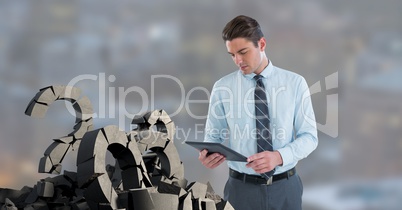 Broken concrete stone with Question symbol and businessman in cityscape