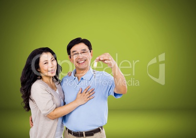 Couple Holding key in front of vignette