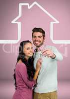 Couple Holding key with house icon in front of vignette