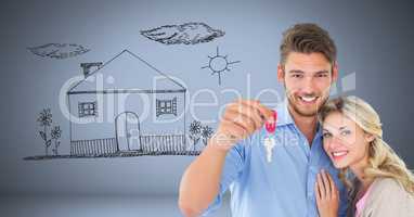 Couple Holding key with house home drawing in front of vignette