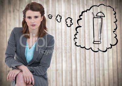 Business woman sitting and dreaming of cocktail against blurry wood panel
