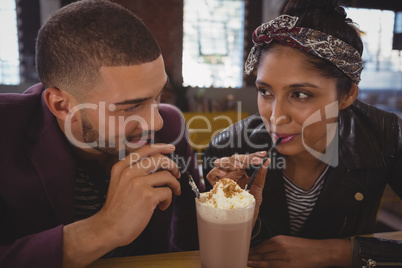 Friends enjoying milkshake