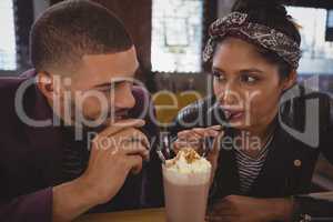 Friends enjoying milkshake