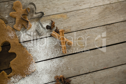 Overhead view of dough with pastry cutter