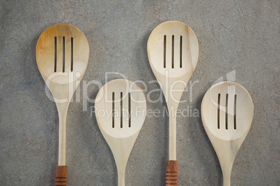 Directly above shot of spatulas arranged side by side